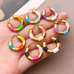 Handheld vintage gold bamboo hoop earrings with colorful enamel dripping detail
