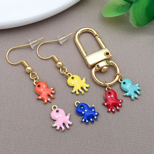 Macro view of colorful double-sided enamel octopus charms for DIY jewelry making