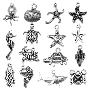 Set of 15 antique silver sea animal charms including starfish and shark for DIY jewelry