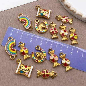 Detailed view of colorful enamel stainless steel rainbow and sweet candy charms with ruler