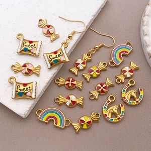 Detailed macro view of colorful enamel sweet candy and rainbow pendants for DIY jewelry