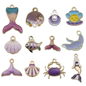 Set de 12 colgantes marinos dorados con sirenas púrpuras y conchas para joyería DIY