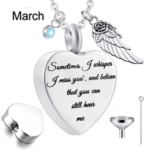 Macro detail of heart urn necklace with March birthstone and filling tool kit