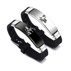 Detail of adjustable couple crown bracelets with Her King and His Queen engravings