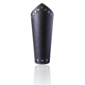 Detail of black leather arm guard with metallic rivets and reinforced stitching for biking