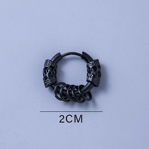Detail view of 2cm black punk hoop earring with skull carvings and five small ring charms