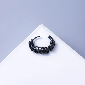 Gothic black steel hoop earring featuring carved skull motifs and five hanging rings