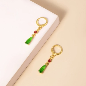 Anime Howl's Moving Castle green teardrop earrings with red crystals in golden huggie style