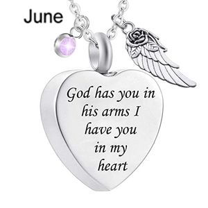 Detail of June heart urn pendant with purple birthstone and engraved memorial quote
