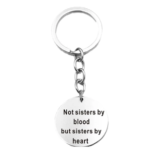 Polished stainless steel friendship keychain with engraved sisterhood quote on round tag