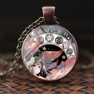 Vintage bronze Cancer zodiac necklace with glass pendant featuring anime style art