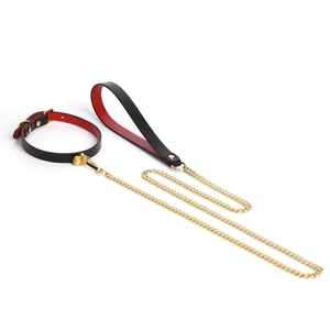 Adjustable black and red leather collar set with a golden bell and matching metal leash