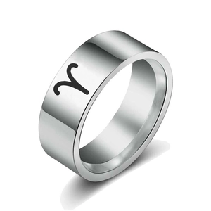 Polished stainless steel Aries zodiac sign ring with minimalist silver finish on white background