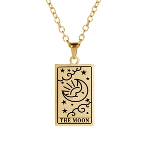 Detailed macro view of the Moon tarot card rectangular golden pendant on a link chain