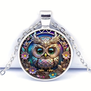 Silver glass cabochon necklace featuring a colorful fantasy owl illustration on white backdrop