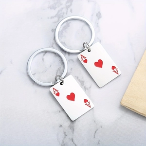 Creative Ace of Hearts playing card keychain set on a modern white marble background