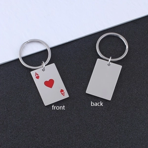 Creative Ace of Hearts playing card metal keychain set with front and back view
