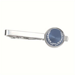Polished silver tie clip with blue-grey circular laurel wreath emblem for business suits