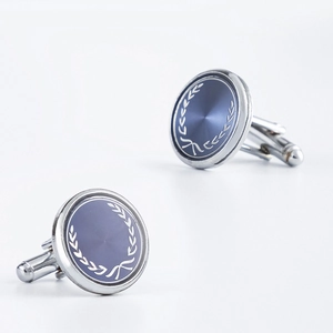 Polished silver stainless steel round cufflinks with blue sunray pattern and laurel wreath