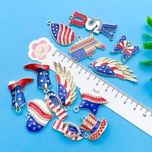 Macro detail of USA flag enamel charms with rhinestones and measurement ruler