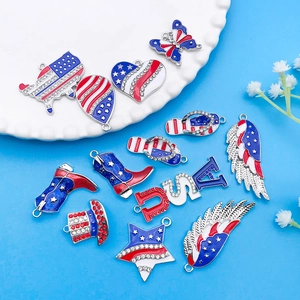 Detailed macro view of American flag theme DIY charms with red blue enamel and rhinestones