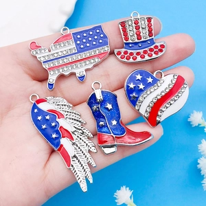 Detailed close-up of 5 American flag themed patriotic charms with rhinestones