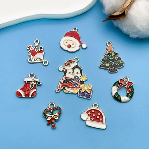 Selección de colgantes navideños de esmalte con Papá Noel y pingüinos para joyería DIY