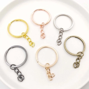 Assorted metal split keychains with links in gold silver bronze and black finishes