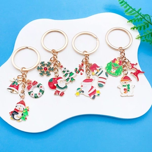 Lot de 4 porte-clés de Noël mignons avec Père Noël, renne, bonhomme de neige