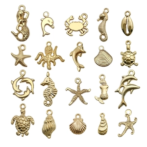 Set de 20 dijes dorados de animales marinos y sirena para la creación de joyas artesanales