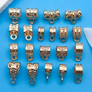 Rejilla detallada de cierres de metal dorado para bisutería DIY en varios estilos