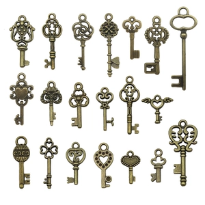 Set de 19 colgantes de llaves vintage de bronce con diseños de corazón para manualidades DIY