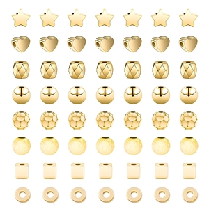 Golden DIY jewelry beads set with star, heart and faceted metal spacers for necklaces