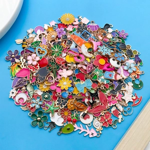 Macro shot of colorful mixed enamel alloy charms in various cartoon and nature shapes