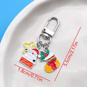 Detail view of Santa and Christmas stocking keychain with precise size measurements