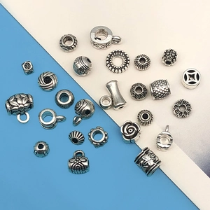 Assorted vintage silver alloy spacer beads and charms for DIY jewelry making