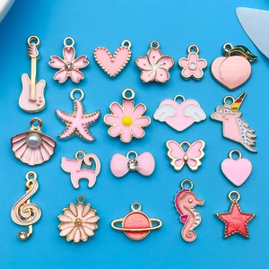 Pink enamel charm set with guitar, heart and unicorn motifs for DIY jewelry making