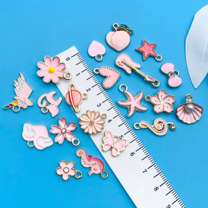 Pink enamel cartoon charms set including flowers and unicorns for DIY jewelry making
