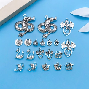 Detailed collection of vintage silver dragon charms and pendants for DIY jewelry making