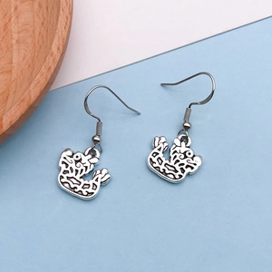 Detailed macro view of S925 silver hollow vintage dragon pattern earring hook