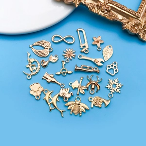 Lot de breloques dorées en alliage de zinc avec dauphins et chats pour bijoux DIY