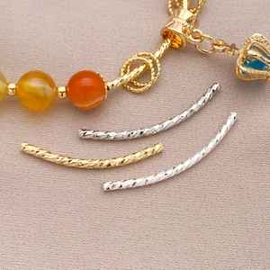 Faceted gold and silver curved tube beads with agate charm for DIY jewelry making