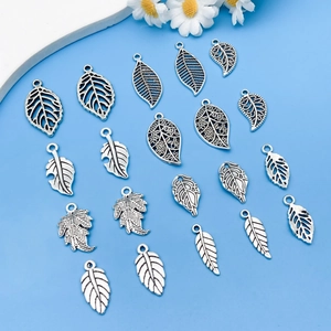 Vintage silver hollow leaf alloy pendants collection for DIY jewelry making