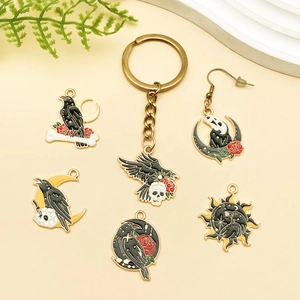 Lot de breloques Halloween gothiques avec corbeau, crâne et rose pour bijoux DIY