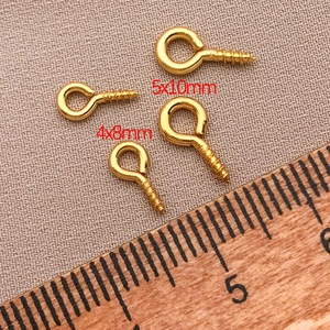 Macro view of 4x8mm and 5x10mm 18k gold plated screw eye pins for jewelry DIY