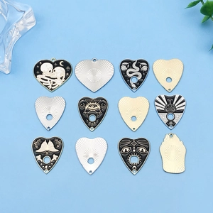 12-piece gothic enamel pendants set featuring skull, cat, snake and all-seeing eye motifs