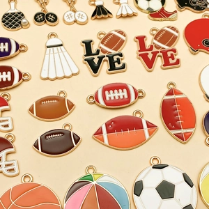 Detail of colorful enamel sports charms including football, basketball and badminton