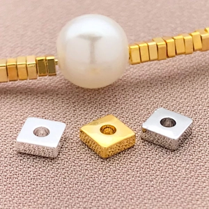 18K gold-plated square spacer beads for DIY jewelry making shown with white pearls