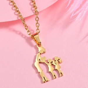 Close-up of gold family silhouette necklace featuring a mother and children pendant