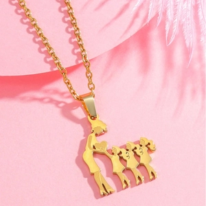Macro detail of golden family silhouette pendant with a mother and three children on a chain
